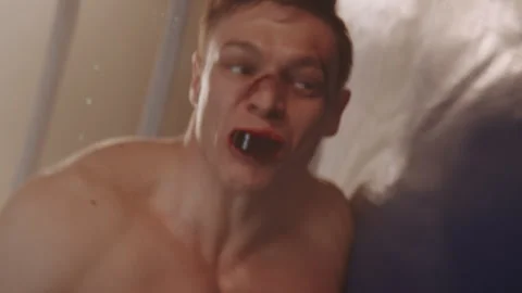 Knockout and Beaten and Bruised boxer Stock Footage 282981647