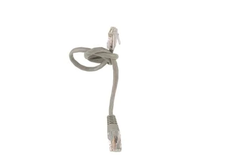 Knotted computer network cable. Stock Photos