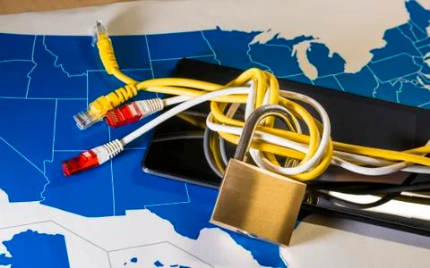 Knotted net cable around a padlock over a US map Stock Photos