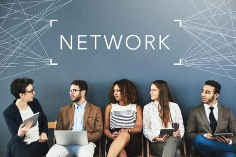 Know the people in your network. Studio shot of businesspeople using wireless 스톡 사진