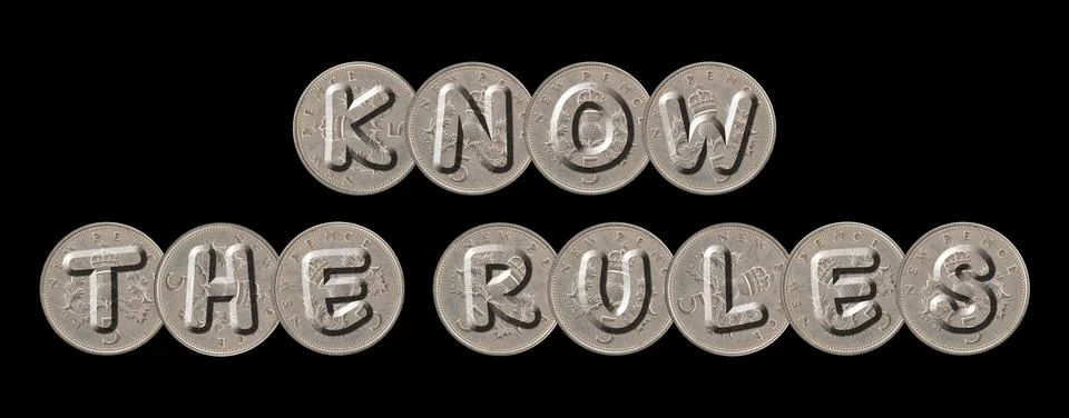 KNOW THE RULES  Coins on black background Stock Photos