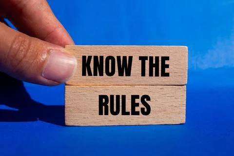 Know the rules message written on wooden blocks with blue background. Concept Stock-Fotos