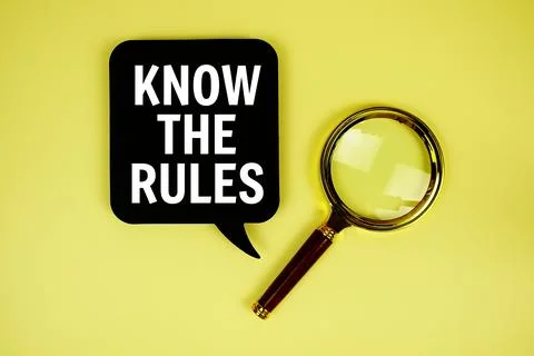 Know The Rules text with speech bubble and magnifying glass on yellow backg.. Stock Photos