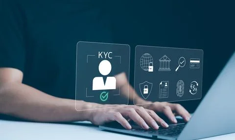 Know Your Customer (KYC) Concept. A person works on a laptop, Stock Photos