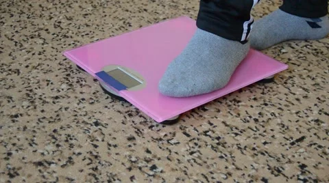 To know your weight Stock Footage 63262576