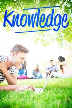 Knowledge against happy student using his laptop outside Stock Photos