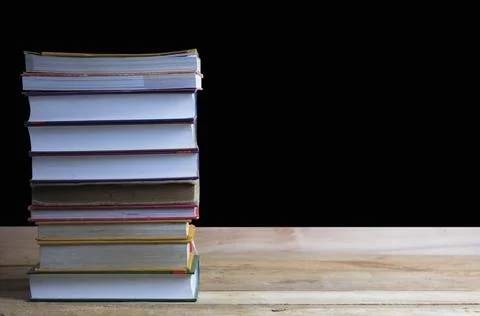 Knowledge and education concept, stacked of books on table Fotos de archivo