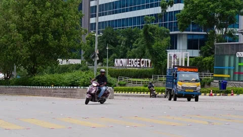Knowledge city logo and vehicles in the road at  hyderabad telangana 4k Stock Footage 252051985