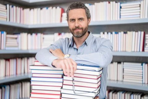 Knowledge day. get knowledge from book. man get university education. school Stock Photos