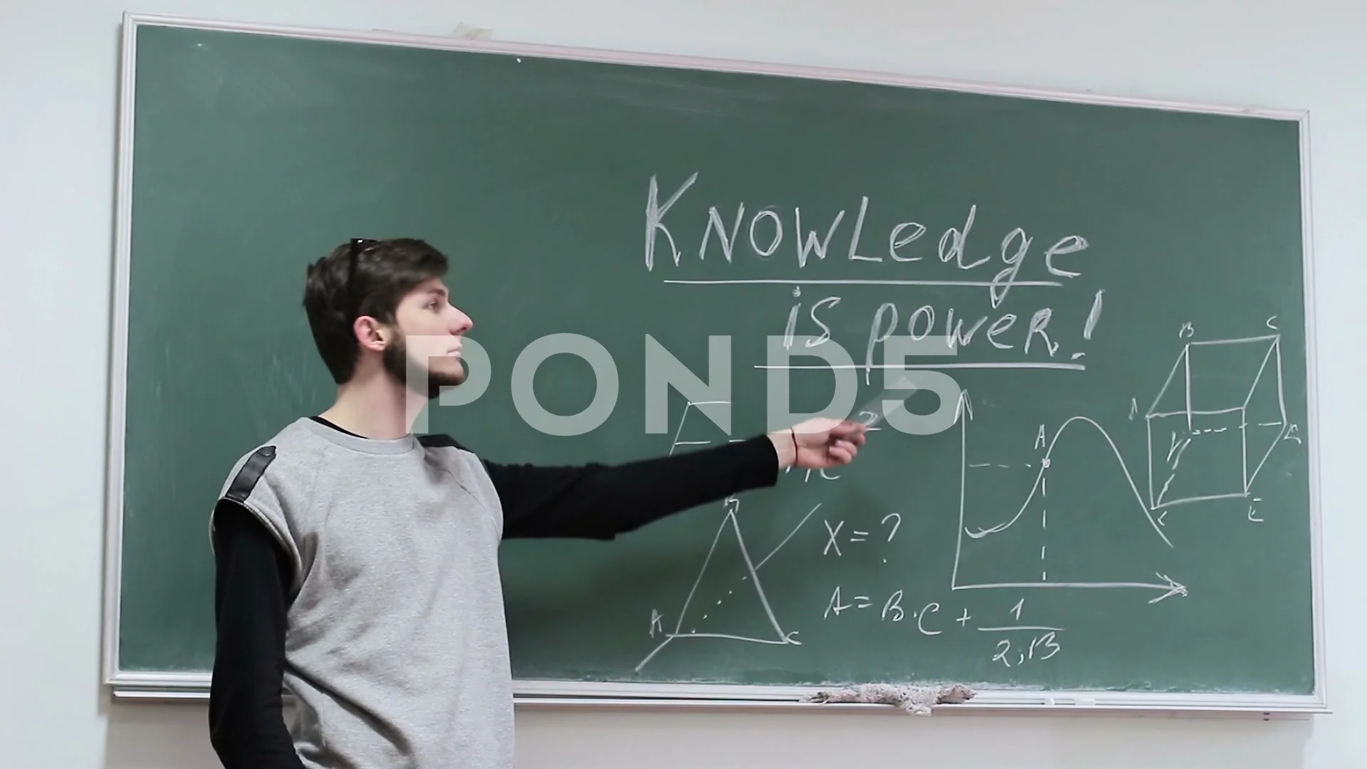 Knowledge is power. Student pointing at ... | Stock Video | Pond5