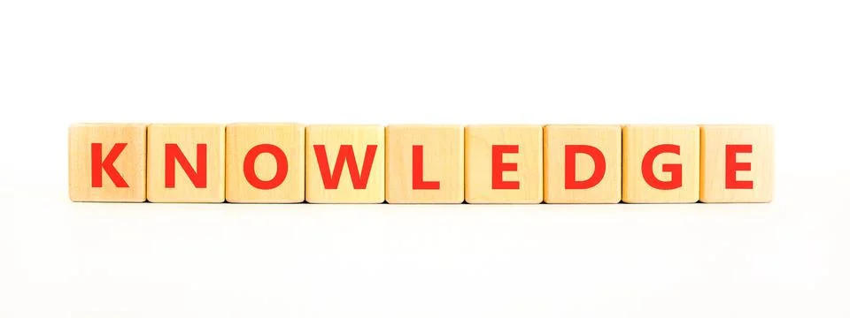 Knowledge symbol. Concept word Knowledge on beautiful wooden blocks. Beauti.. Stock Photos
