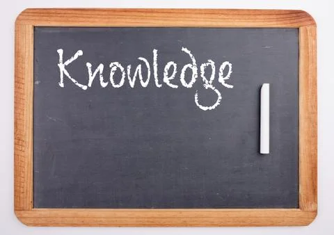 Knowledge text on blackboard Stock Photos
