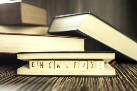 Knowledge text in book, education learning concept with opening book or textbook Stock Photos