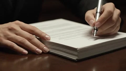 Knowledge Unveiled: Hands Flipping Through Pages of a Book Stock Footage 313246339