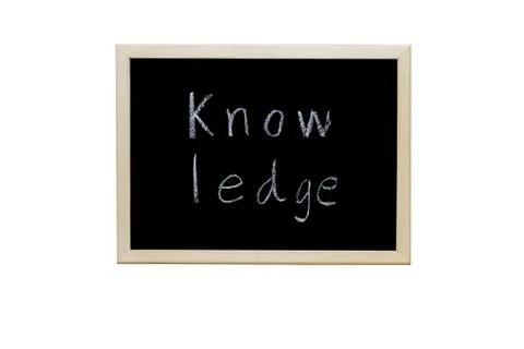 Knowledge written with white chalk on blackboard. Stock Photos