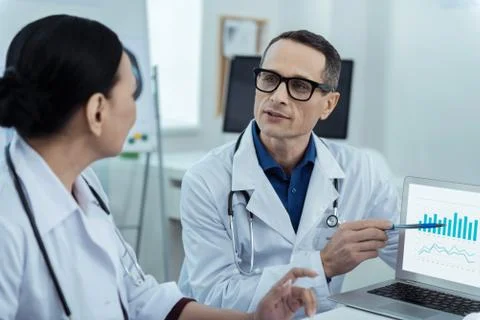 Knowledgeable doctors having a discussion Stock Photos