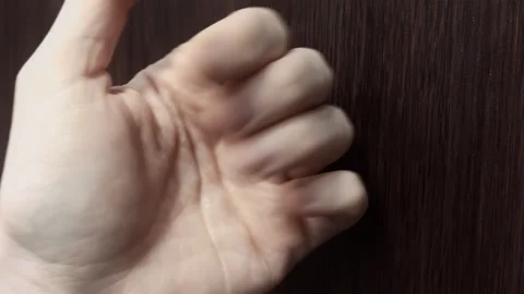 Knuckles bang on front door. Close up view male hand knocking wood door surface. Stock Footage 342920266