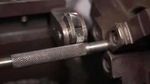 Knurling process lathe machine Stock Footage 212497314