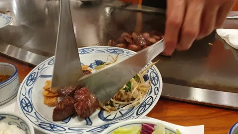 Kobe beef steak juicy meat serve tepanyaki cooking marble beef Japanese style Stock Footage 242570957