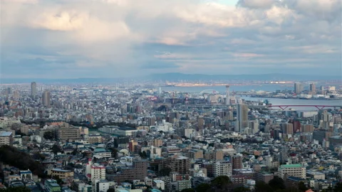 Kobe city buildings upper view on day timelapse Video stock 116668051