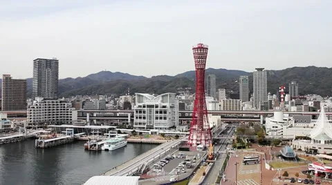 Kobe Harbor with Kobe Tower and mountains Stock Footage 47938983