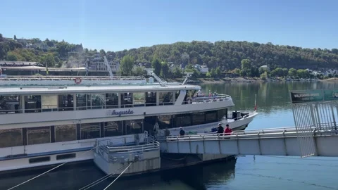 Koblenz, Germany, August 12, 2026 selective focus cruise ship arriving at t.. Stock Footage 344930968