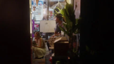 Koh Chang Restaurant Workers Having a Meal Break in Kitchen Stock Footage 337532394