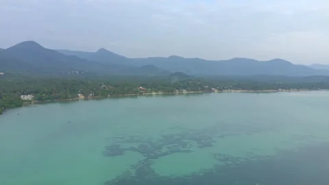 Koh Phangan Drone view of tropical island coastline at sunset Stock Footage 328964838