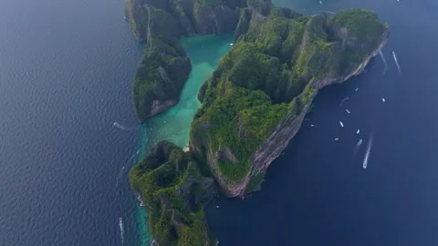 Koh Phi Phi Lee aerial view with Maya Bay and turquoise Phi Leh Bay Stock Footage 303357985
