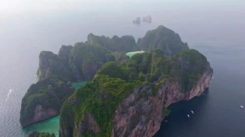 Koh Phi Phi Lee aerial with Maya Bay beach and Phi Leh Bay lagoon Stock Footage 303358771