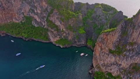Koh Phi Phi Lee scenic aerial with Maya Bay beach and limestone cliffs Stock Footage 303358189