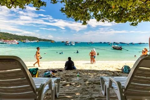 Koh Phi Phi - November 26 2019: Beach chairs at Loh Dalum Beach in Phi Phi Is Stock Photos
