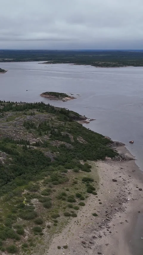Koksoak River Rocky Point Vertical Drone Aerial Push In Kuujjuaq Quebec Summer Stock Footage 345165958