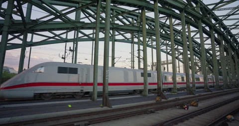 KOLN - GERMANY Train traffic and pedestrian cross Hohenzollern bridge by day Stock Footage 250085923