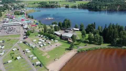 Kolnas, Camping Area and Sunne Sommarland, Lake Fryken, Aerial Establishing shot Stock Footage 347060007