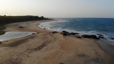 Komari Drone Alongside the beach and into the waters 3 Stock Footage 128656076