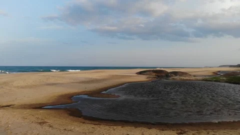 Komari Drone Alongside the beach and into the waters 5 Stock Footage 128656104