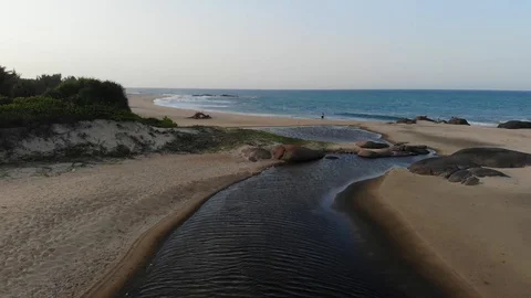 Komari Drone Alongside the beach and into the waters 2 Stock Footage 128656115