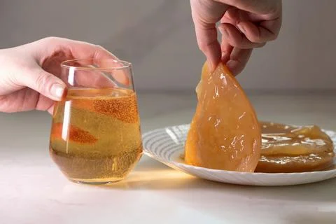 Kombucha Fermentation Process Showcasing Bubbles and Trendy Drink Preparation Stock Photos