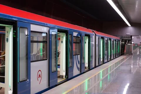 Kommunarka platform with a train standing at the platform. Stock Photos