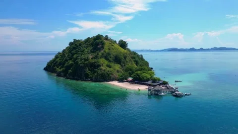 Komodo island paradise beach, jetty, turquoise ocean. Majestic aerial view drone Stock-Footage 344616632