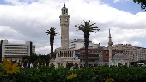 Konak Square with old clock tower and mosque Stock Footage 242168753