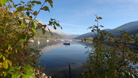 Kootenay Lake Mirror Reflection Dawn Nelson BC 4K UHD Stock Footage 339373111