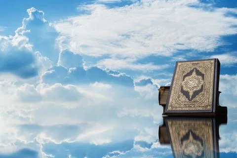 Koran with Clouds in the sky Stock Photos