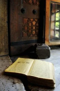 Koran at windowsill Stock Photos
