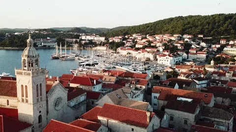 Korcula. A drone flyby a curch over Croatian village at Dalmatian coast. 4K Stock Footage 246921671