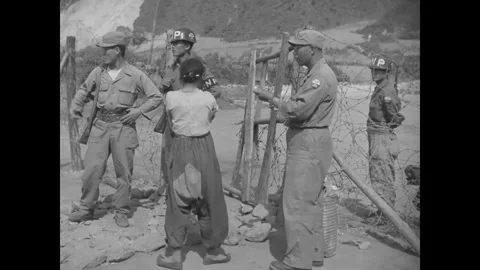 KOREA - 1952 - US Army MPs vaccinate Korean refugees. Stock Footage 340665799