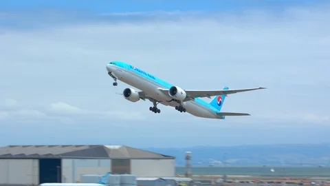 Korean Air Boeing 777 Taking Off from San Francisco SFO Stock Footage 124825302