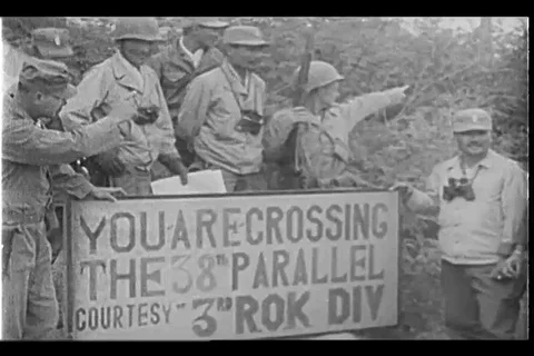Korean and U.S. 7th Cavalry troops cross the 38th parallel - 1951 Stock Footage 106268143