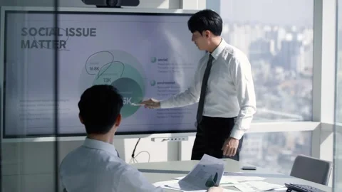 Korean Businessman Explaining Chart During Office Presentation Stock-Footage 337914004